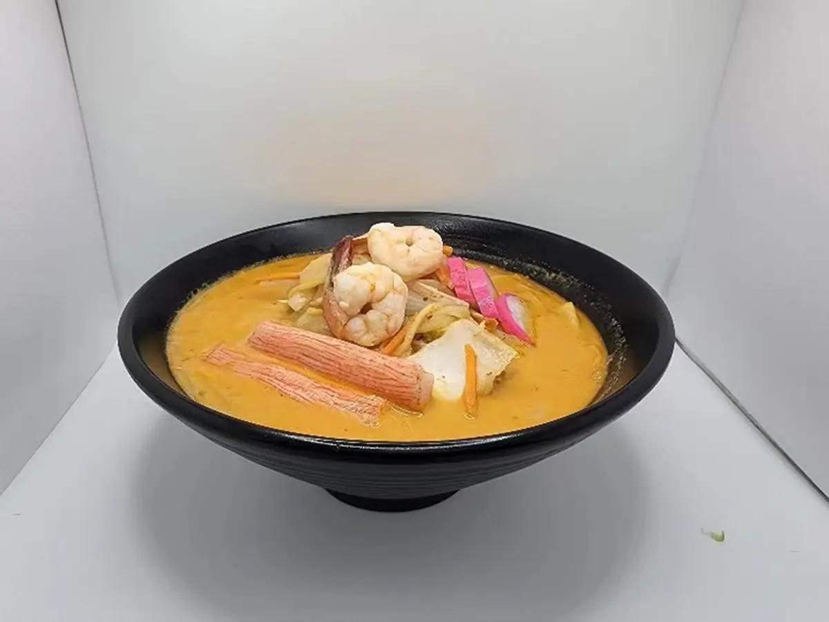 Creamy seafood curry ramen with shrimp and crab stick at Suisen Ramen & Sushi, a Ramen Restaurant in Oxnard